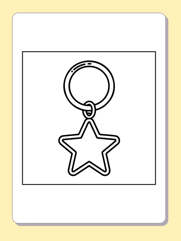 Five-point star charm hanging from a plain circular key ring