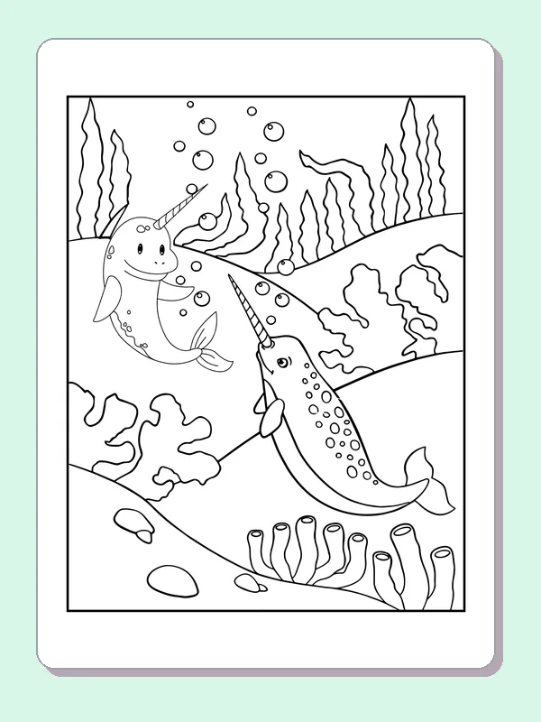 Black and white whale coloring page: a narwhal swims above rocks and undersea plants with bubbles overhead